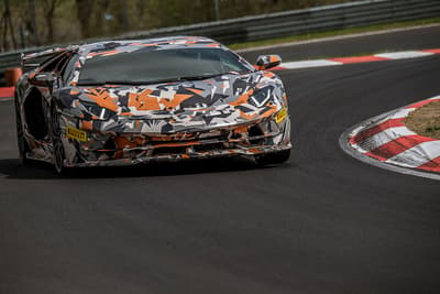 Lamborghini cornering on racetrack
