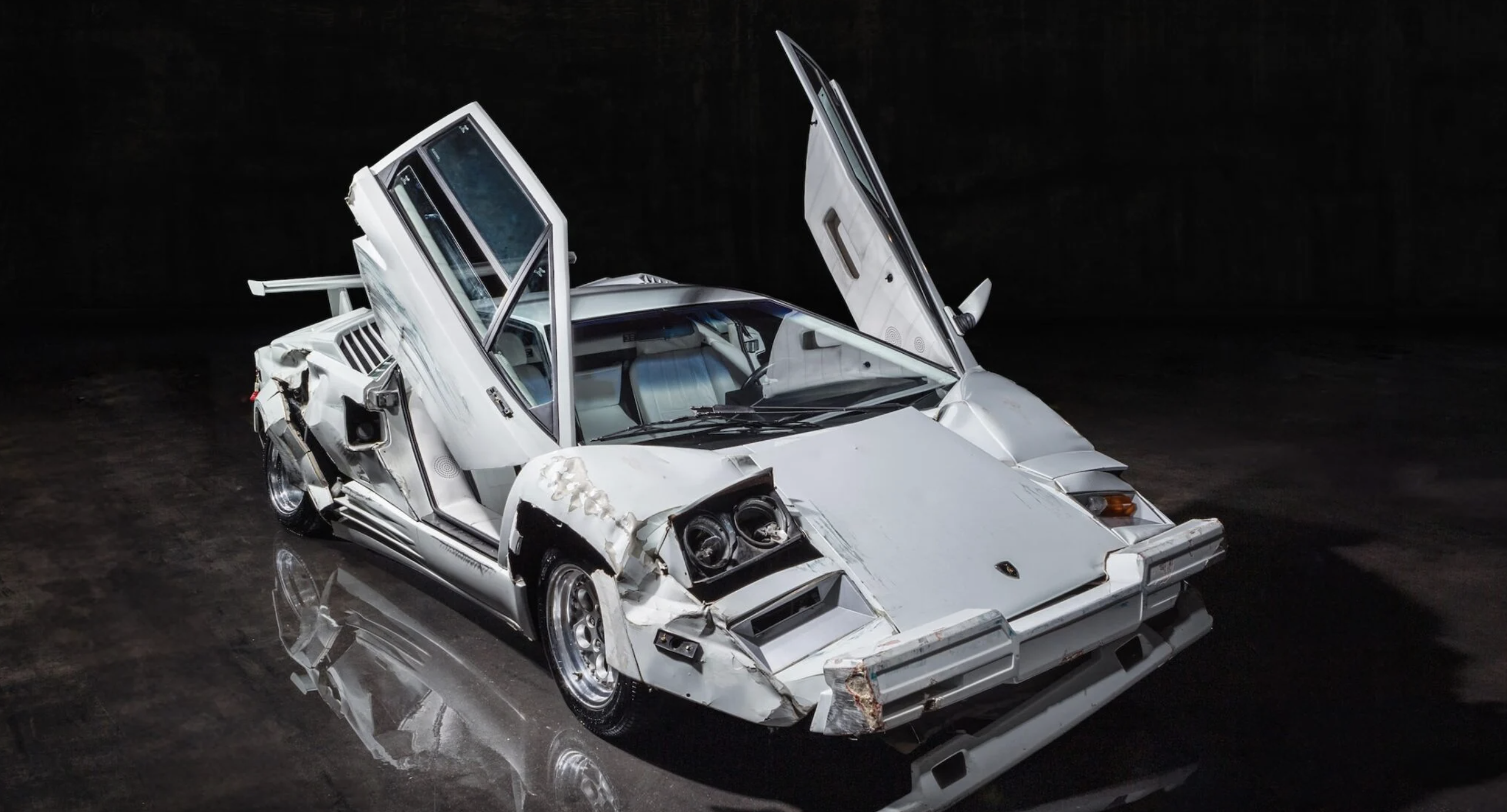 Damaged lamborghini countach from the wolf of wall street